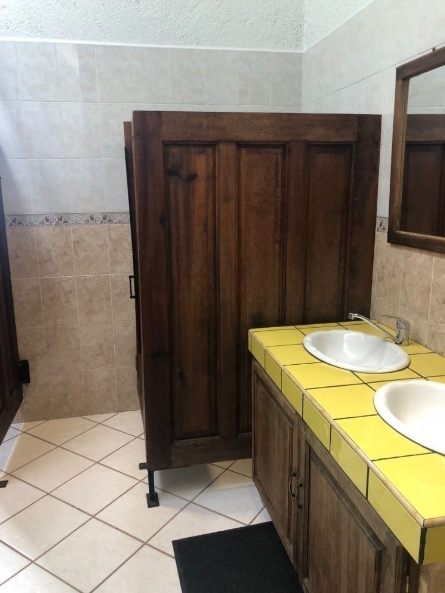 10 de 11: Baños casa club