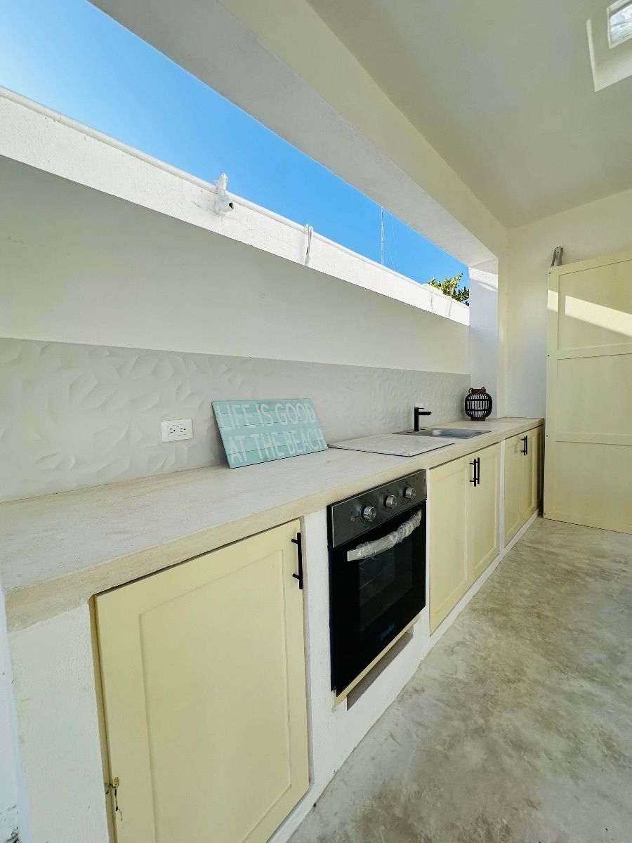 21 of 42: Una cocina al exterior