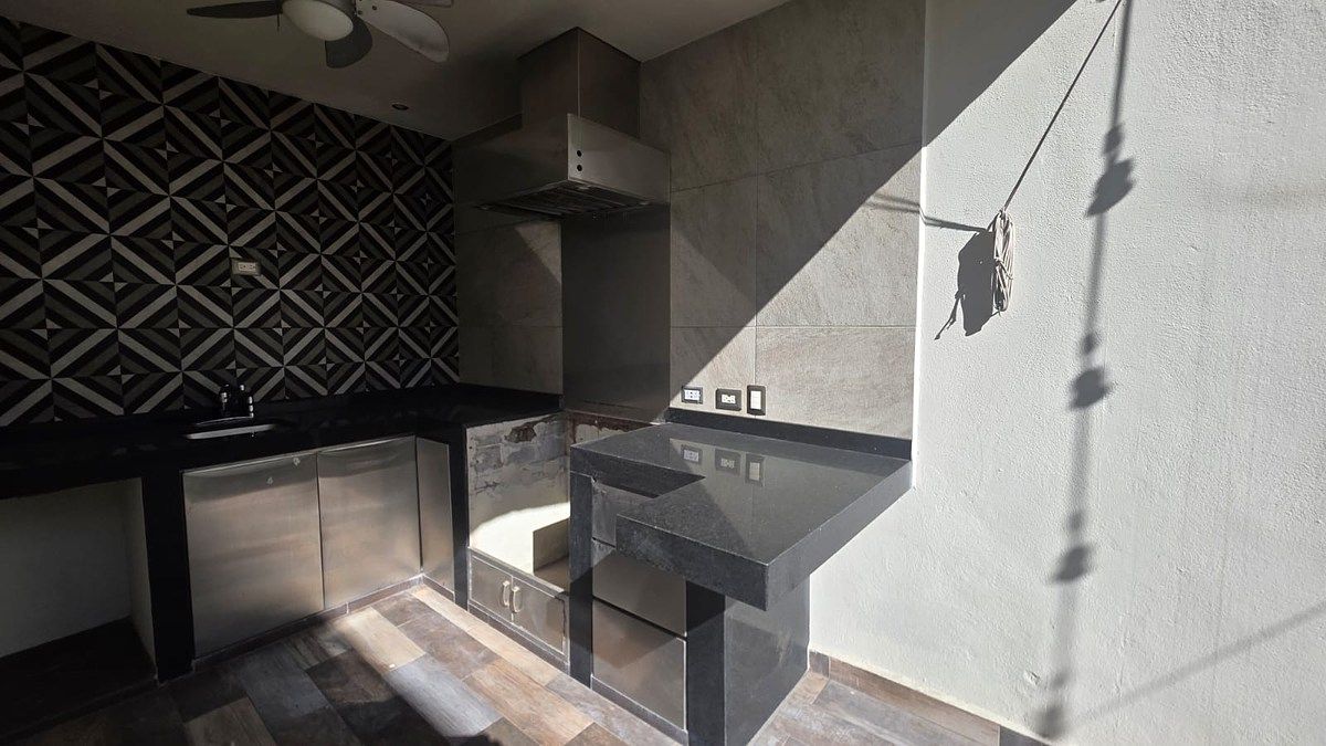 41 de 50: ÁREA PARA ASADOR