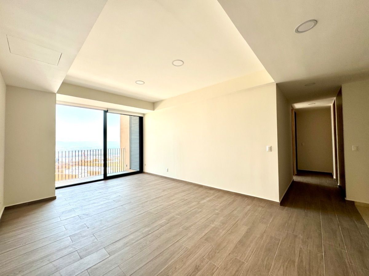 11 de 21: Estancia para comedor y sala y acceso a las habitaciones