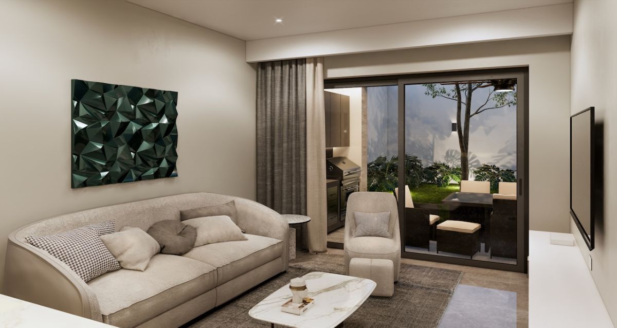 5 de 11: Family room adjunto a la cocina y con acceso al asador