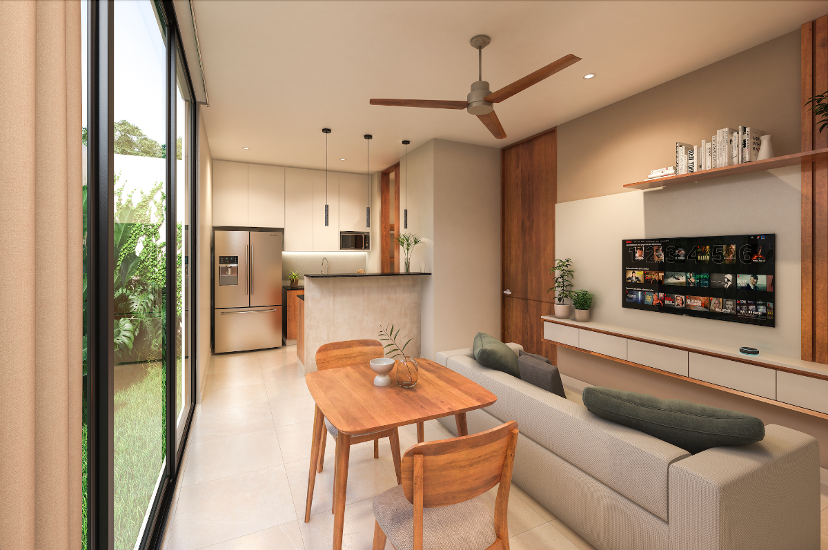 2 of 10: Cocina, sala y desayunador con vista al jardín.