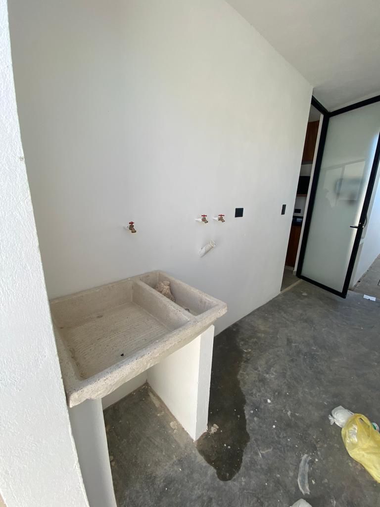 22 de 22: Área de lavado con espacio para lavadora y secadora