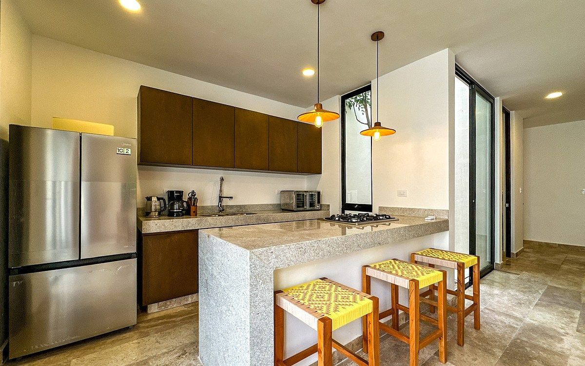 8 de 34: Cocina con Barra Desayunador