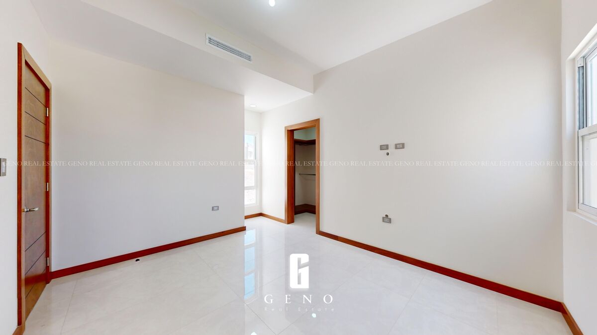 Recámara secundaria 2 con vestidor y baño completo