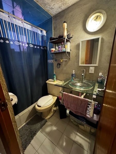 3 de 5: Baño