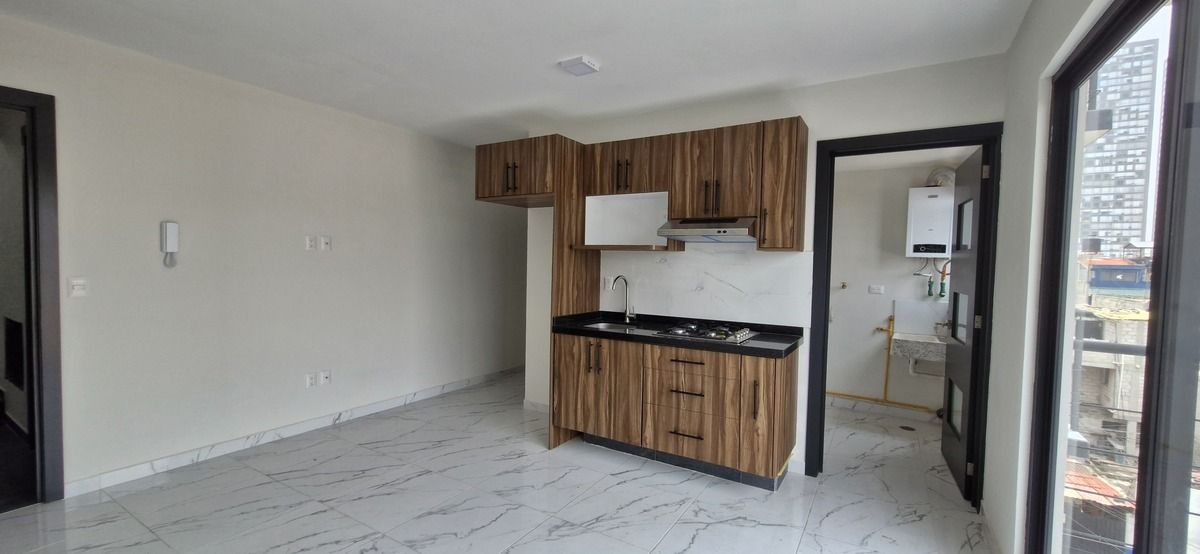 1 de 27: Amplia estancia con cocina abierta
