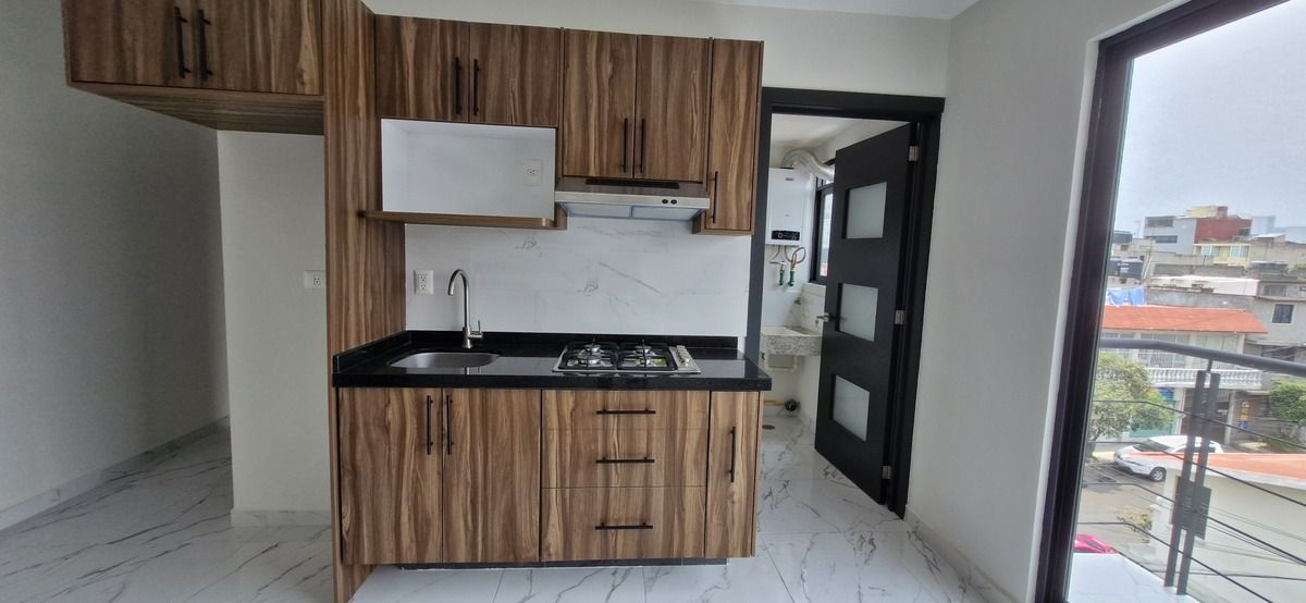 3 de 27: Hermosa cocina con modernos acabados y funcional diseño