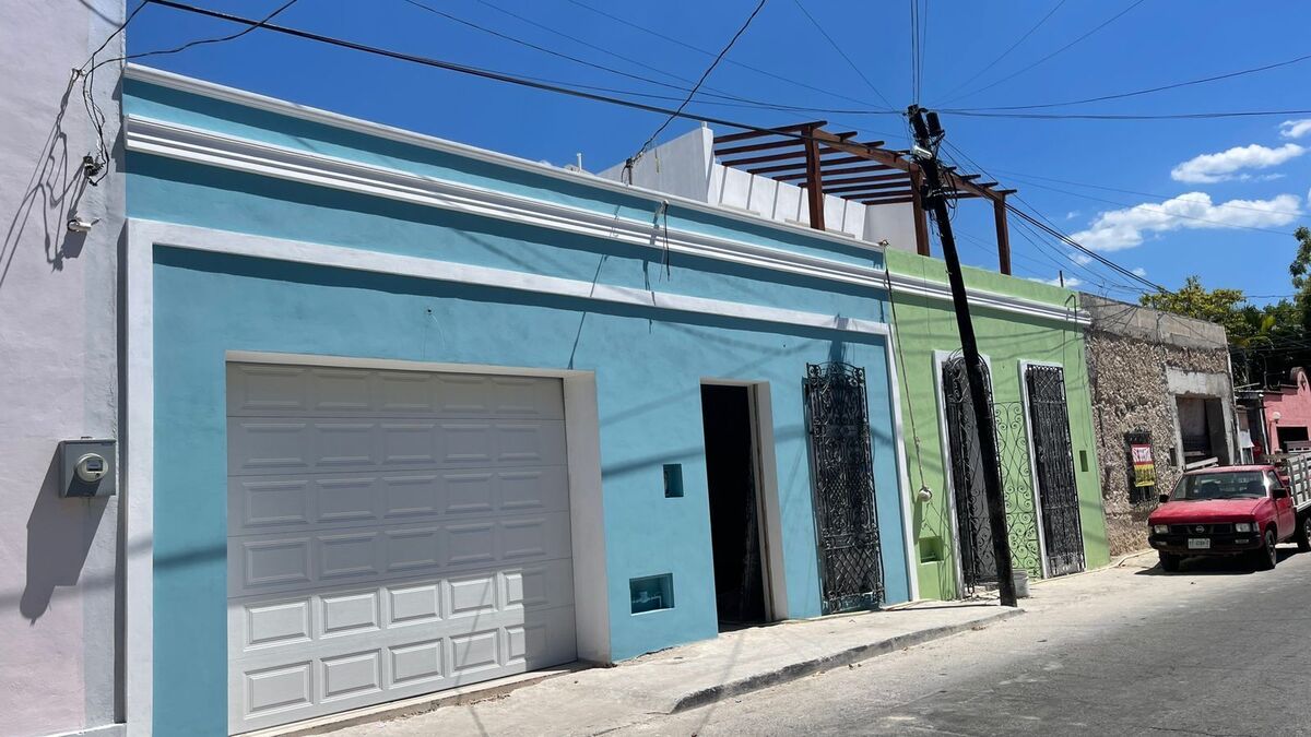 2 de 22: Fachada Principal Lateral