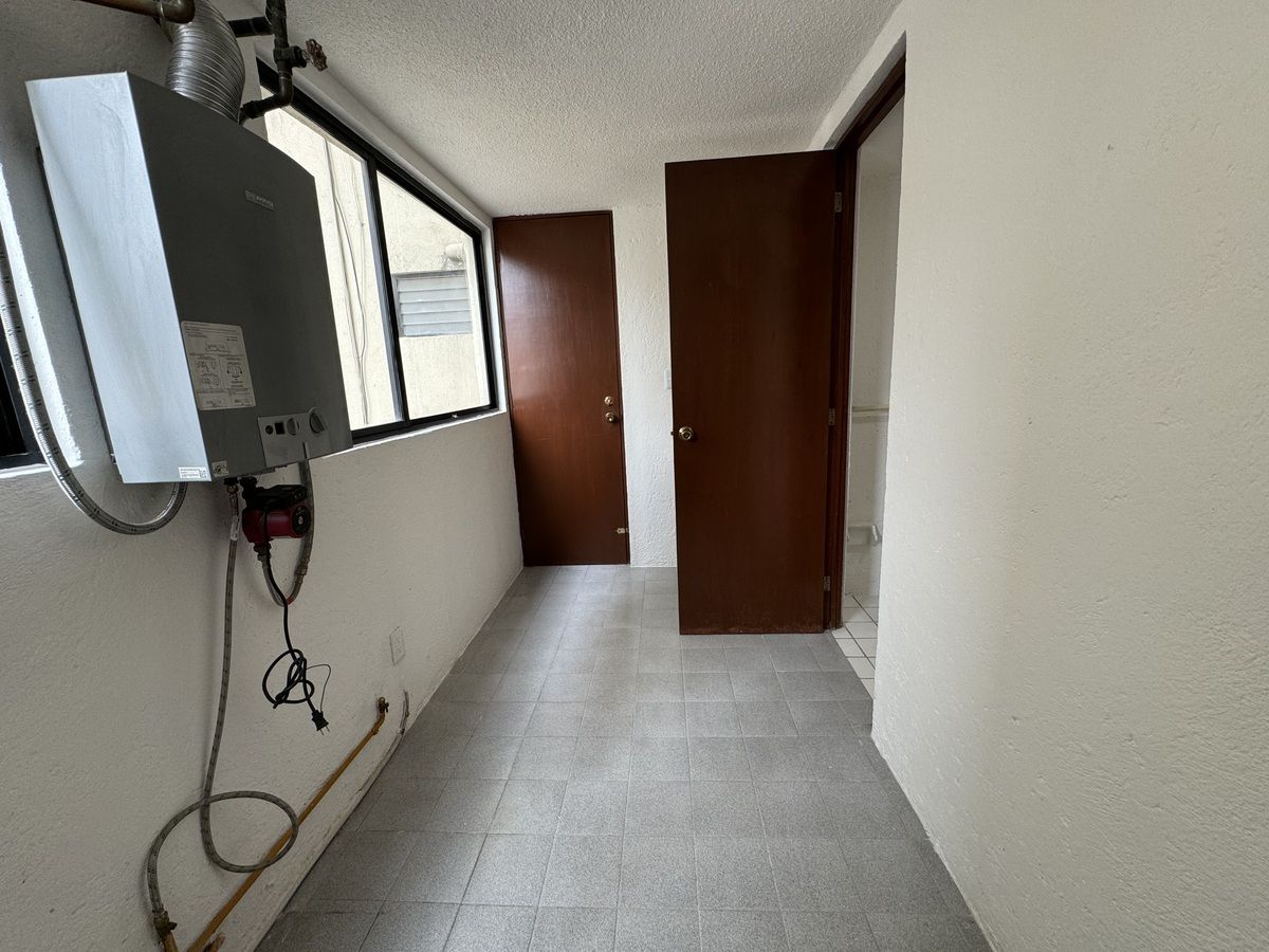 23 de 26: Área lavandería