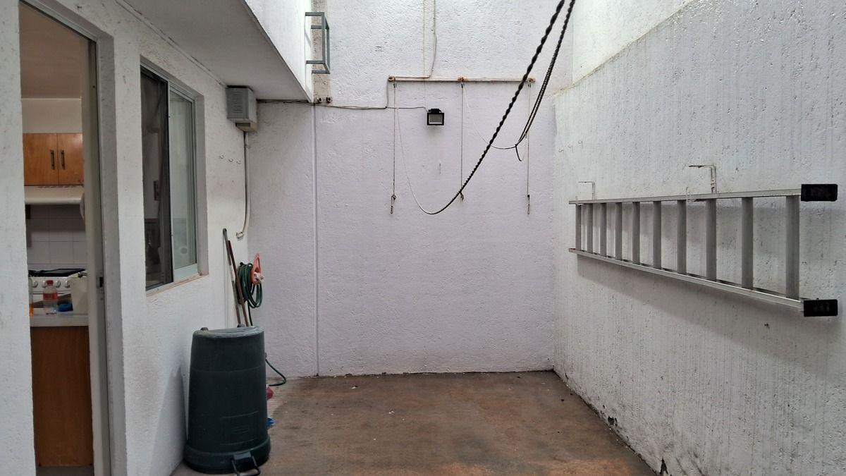 Patio con área de tendido
