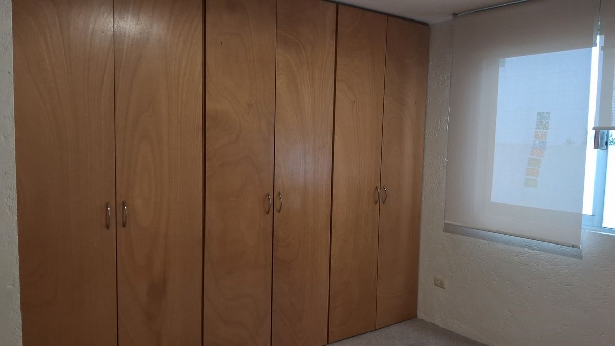 Closet de madera en recámaras secundarias