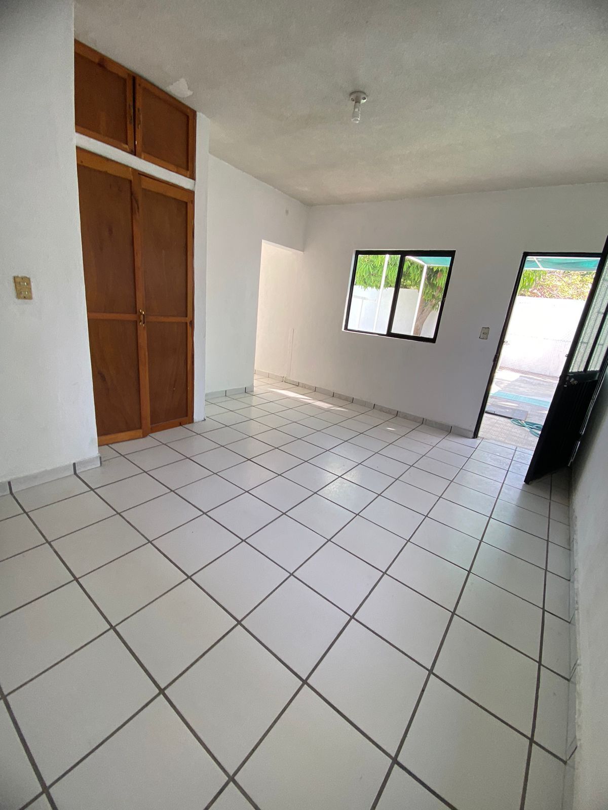 35 de 39: Departamento con baño privado patio trasero