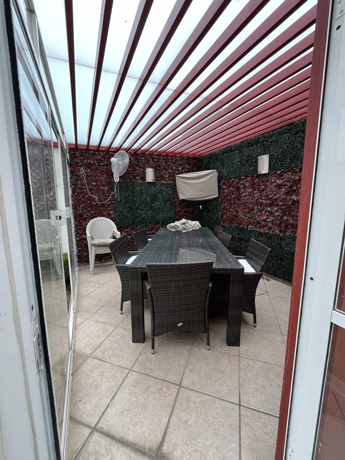 8 de 17: Saloncito en jardín