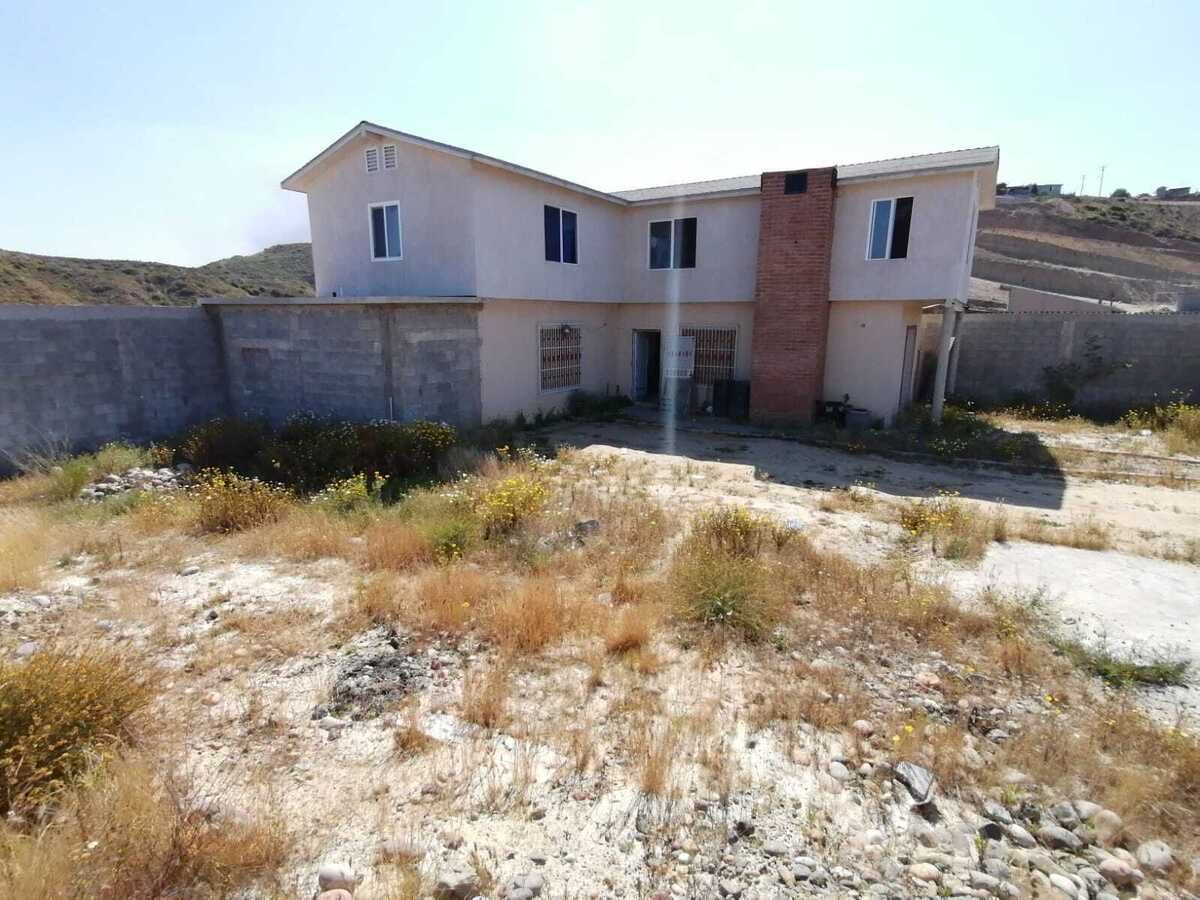 2 of 24: Visa exterior de Casa