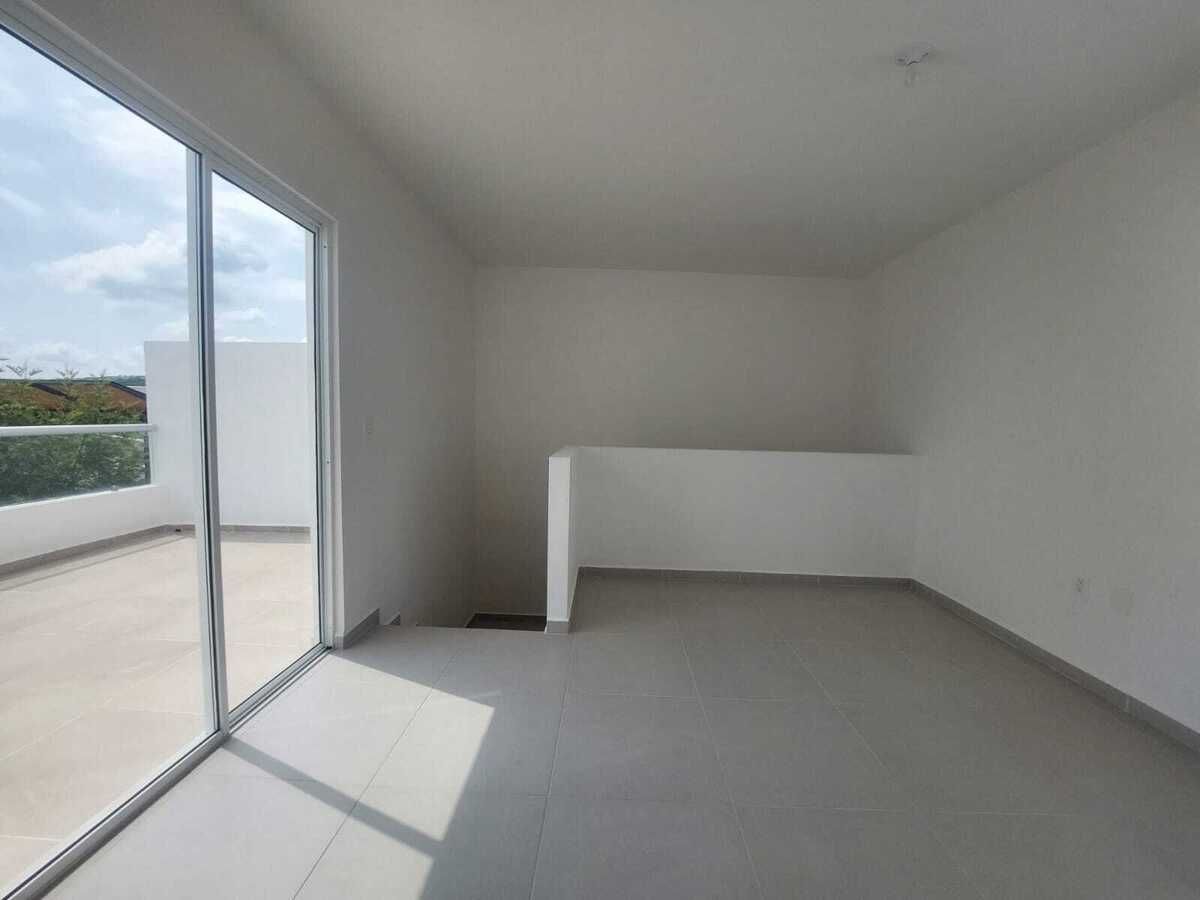 18 of 23: Area social en Roof garden con baño completo