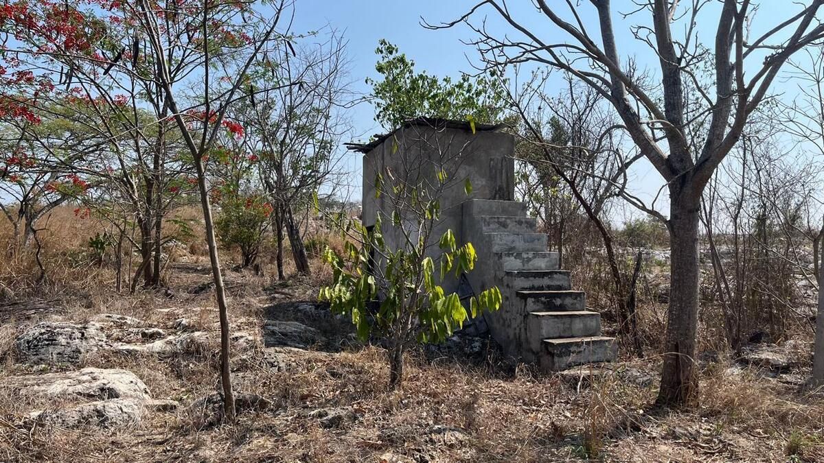 baño y tanque del terreno