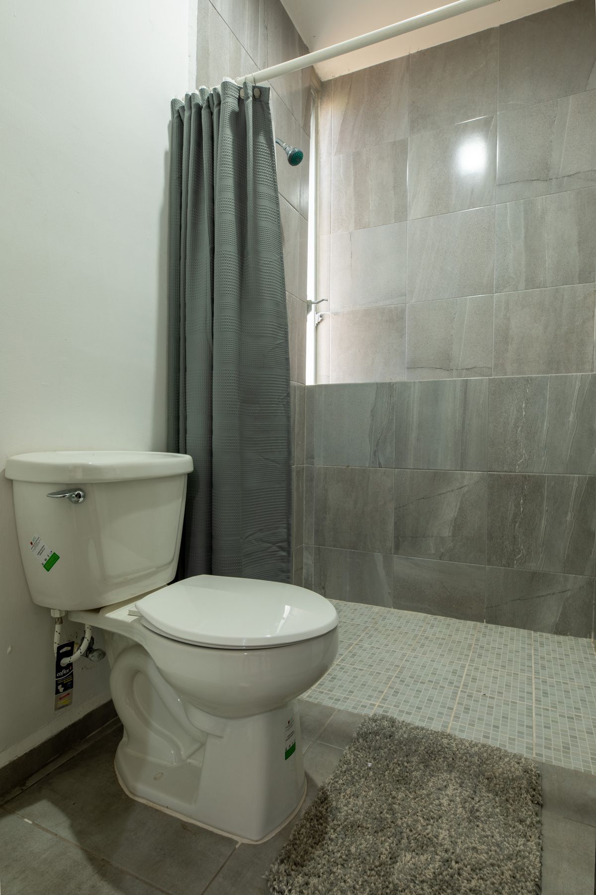 7 de 11: Baño Compartido