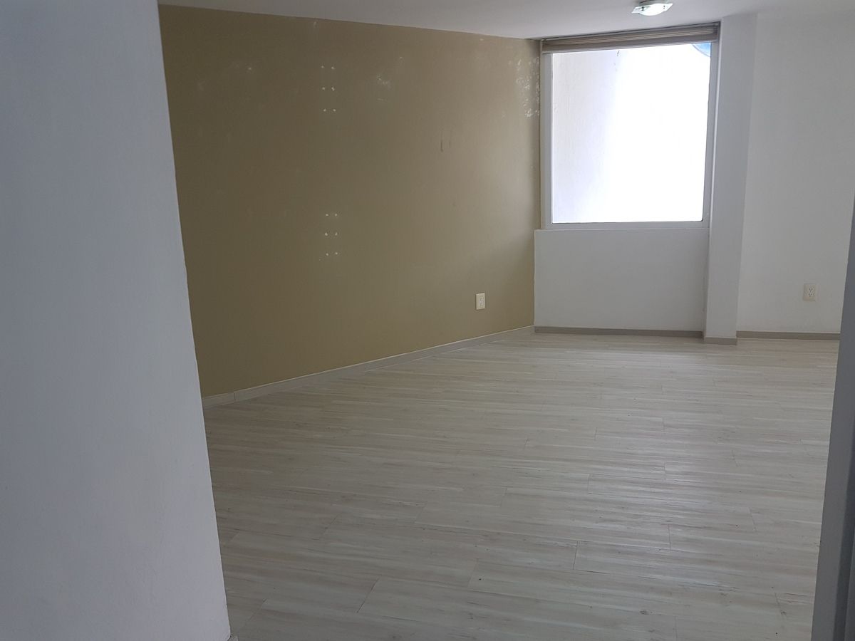 26 de 27: Vista desde el pasillo del cuarto de lavado