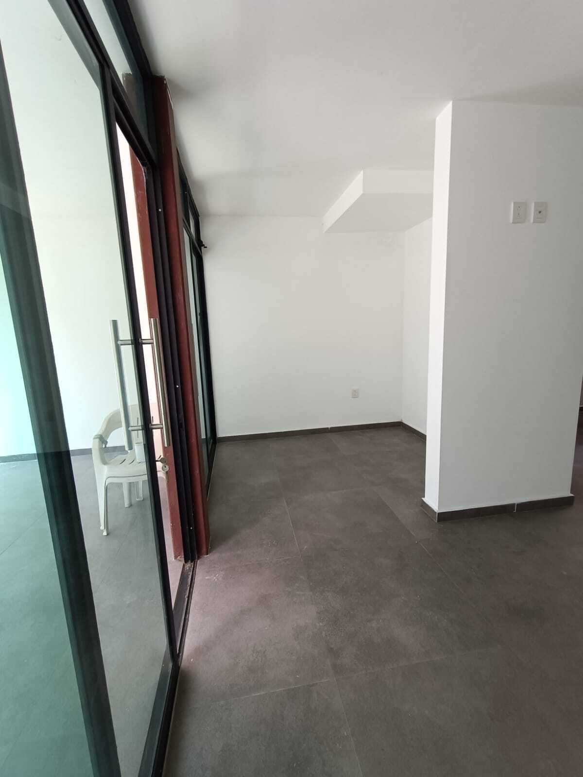 Área de cantina o despacho / oficina.