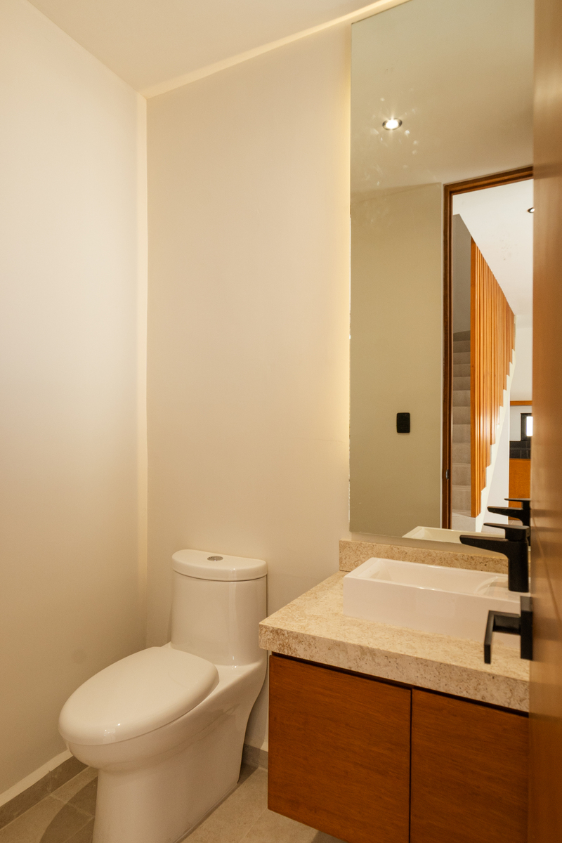 6 de 11: Medio Baño