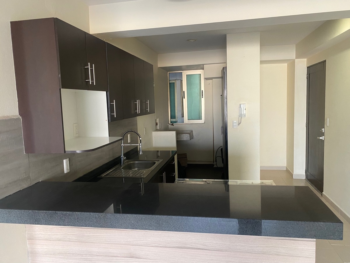 16 of 28: AREA DE LAVADO AL FONDO