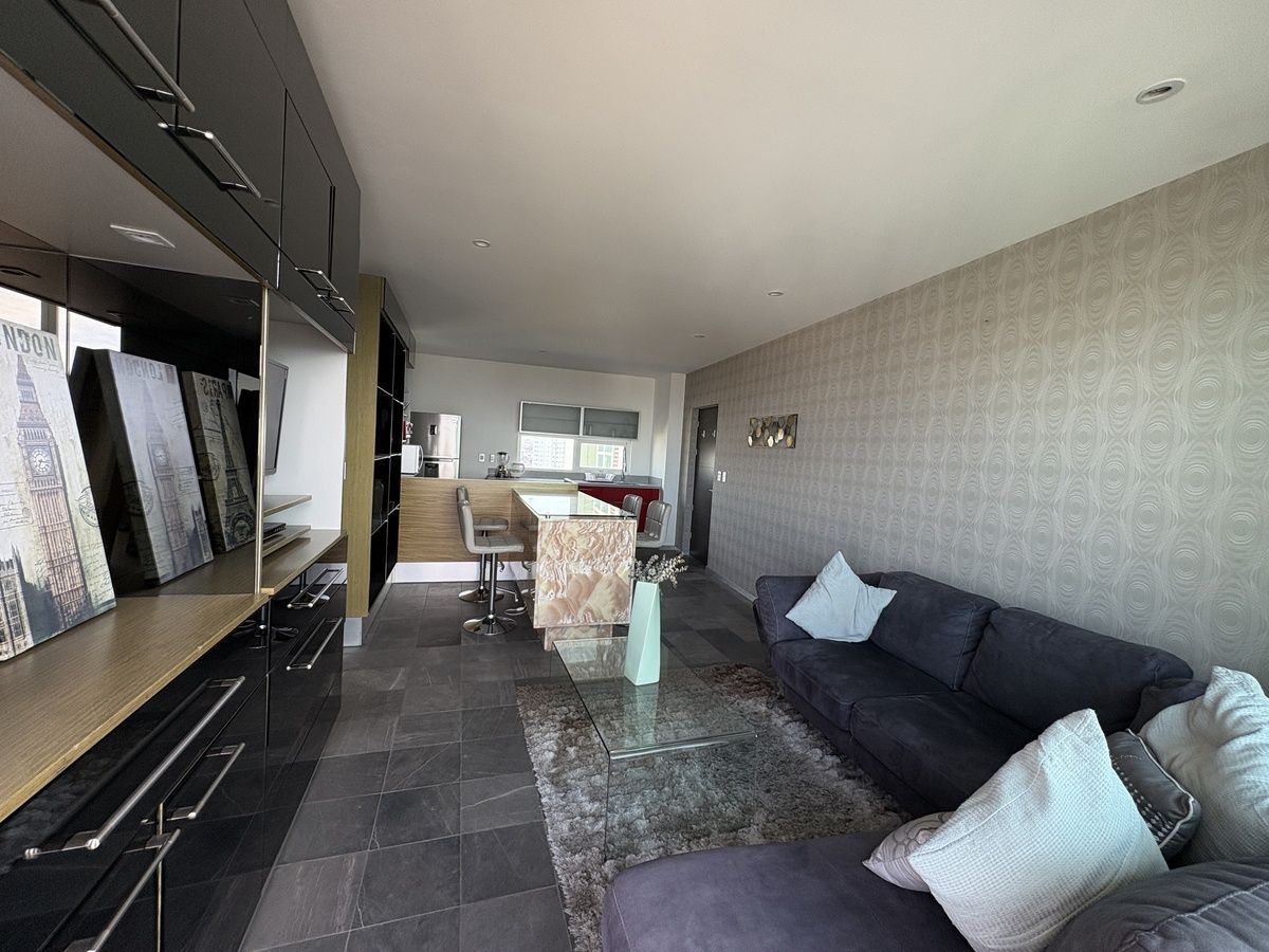 8 de 26: Sala con TV