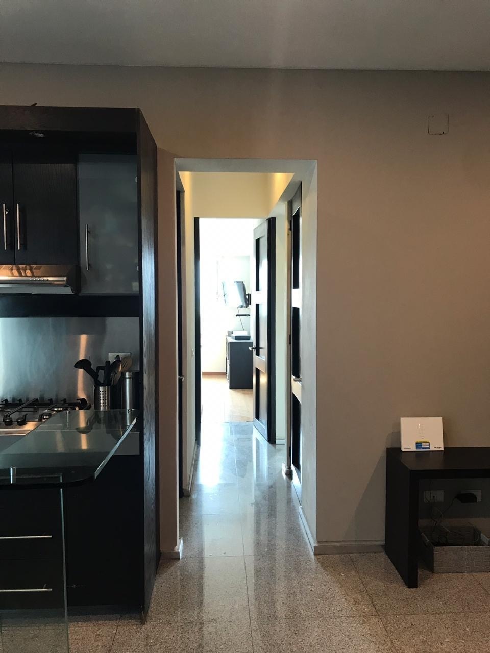 9 of 21: Cocina vista a recamara