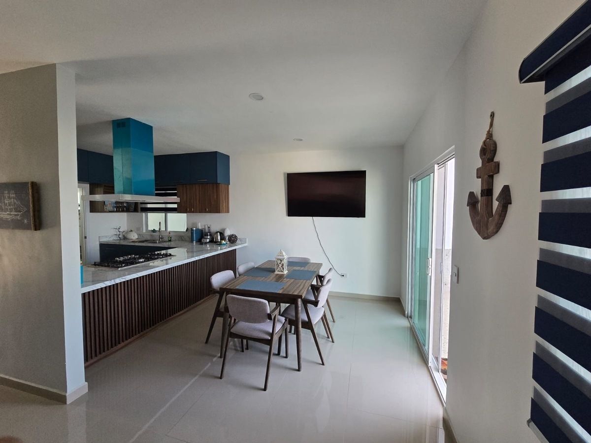 11 de 23: Vista de comedor y cocina