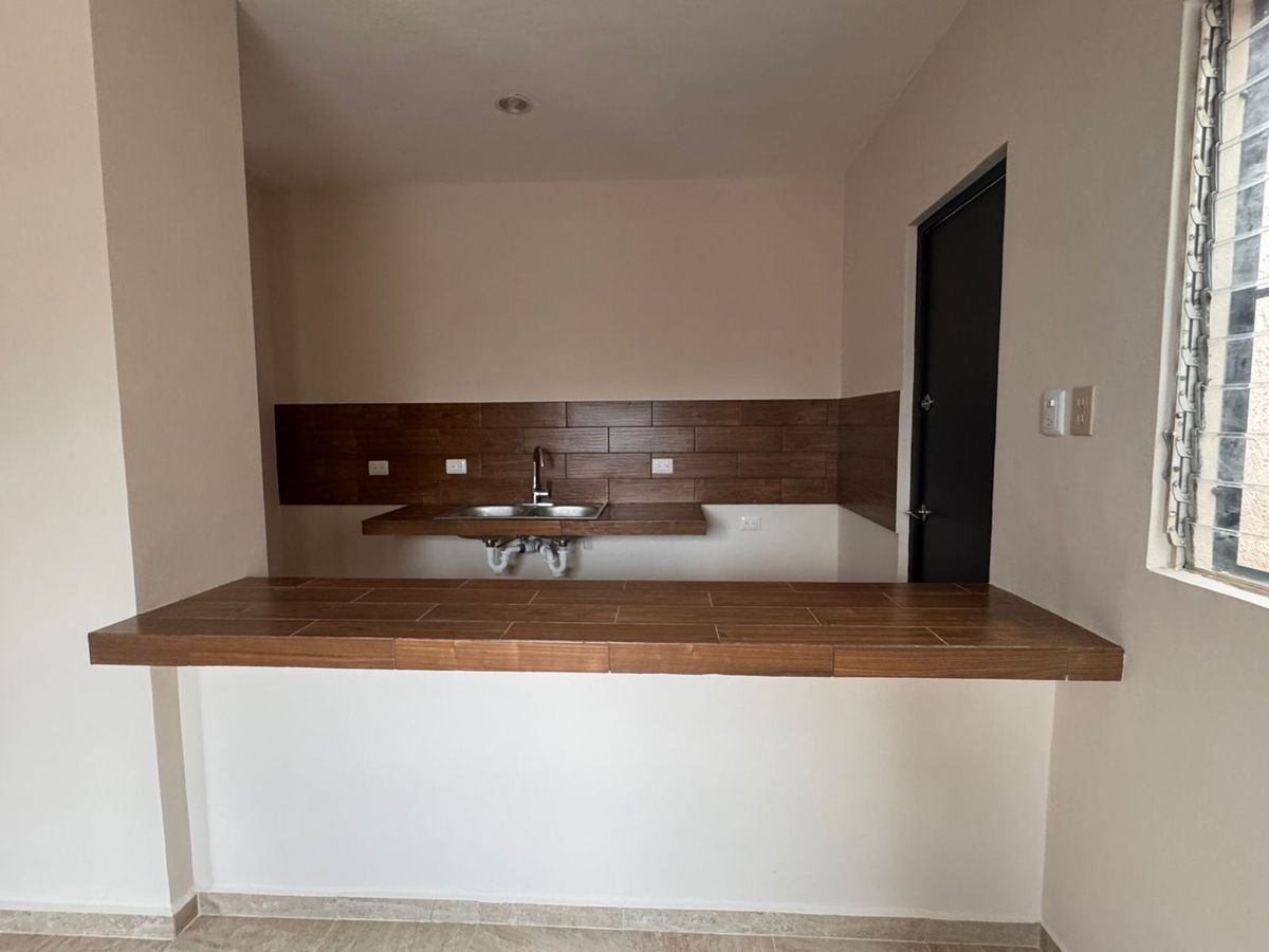 6 de 17: Cocina, meseta desayunador