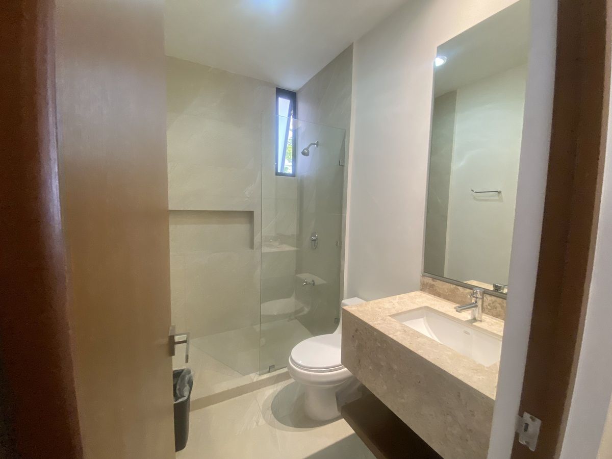 10 de 16: Baño compartido