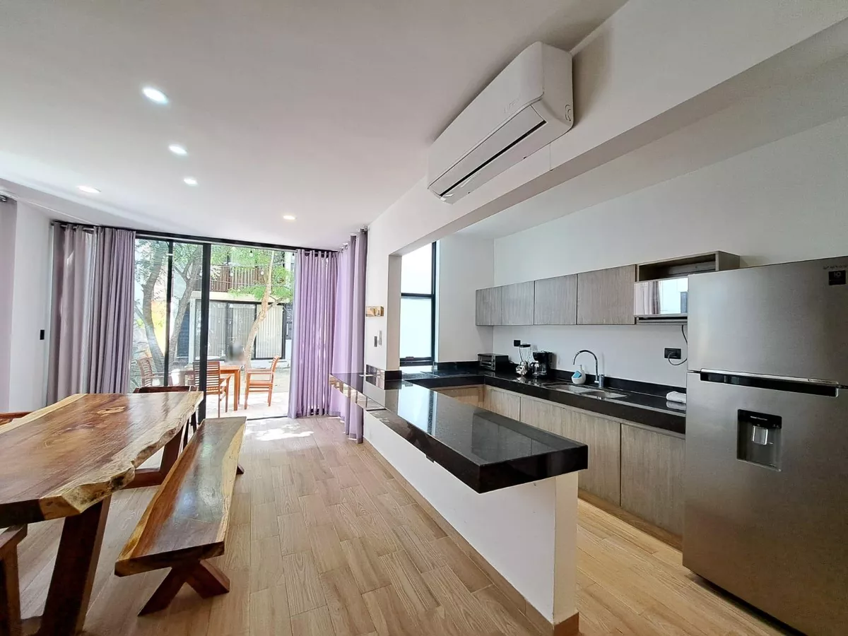 5 of 16: VISTA COMEDOR Y COCINA