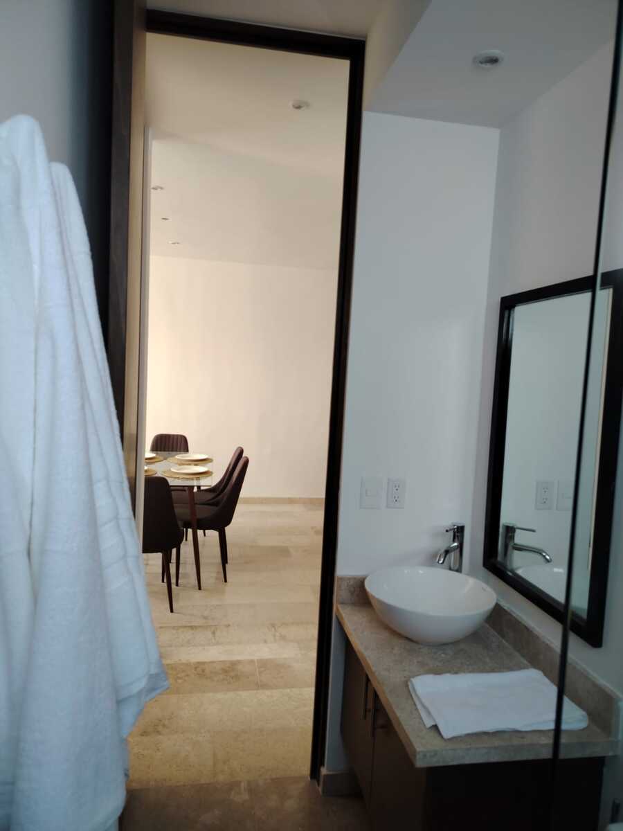 8 de 15: Baño Compartido