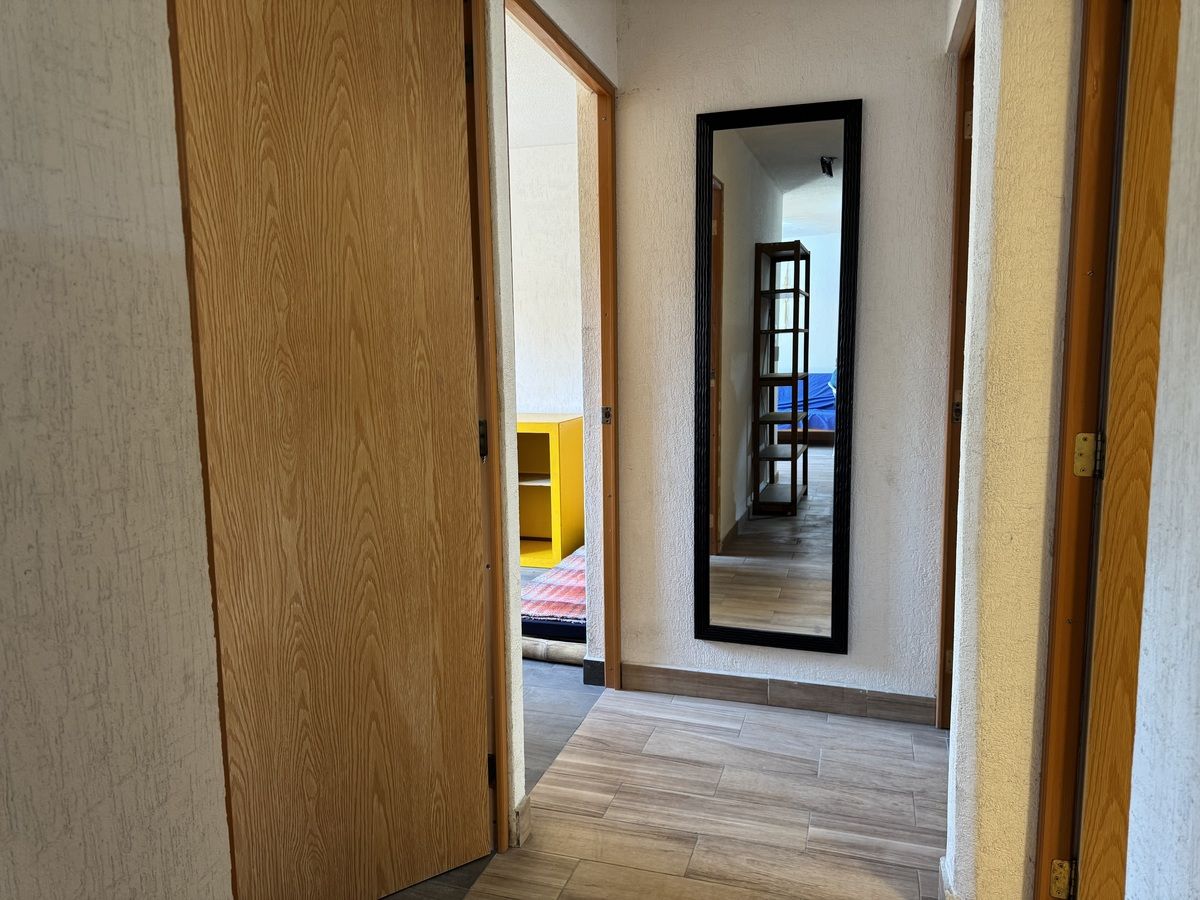 14 de 26: Pasillo hacia área familiar