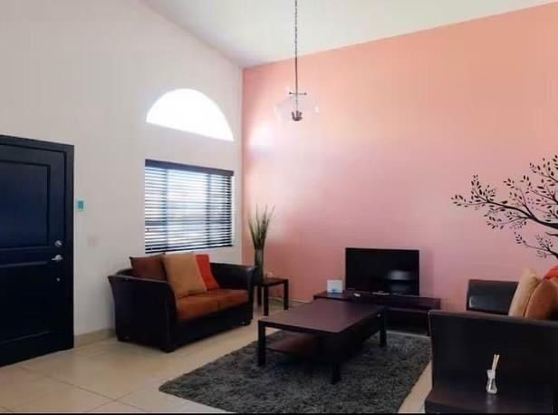 8 de 13: Sala con Tv