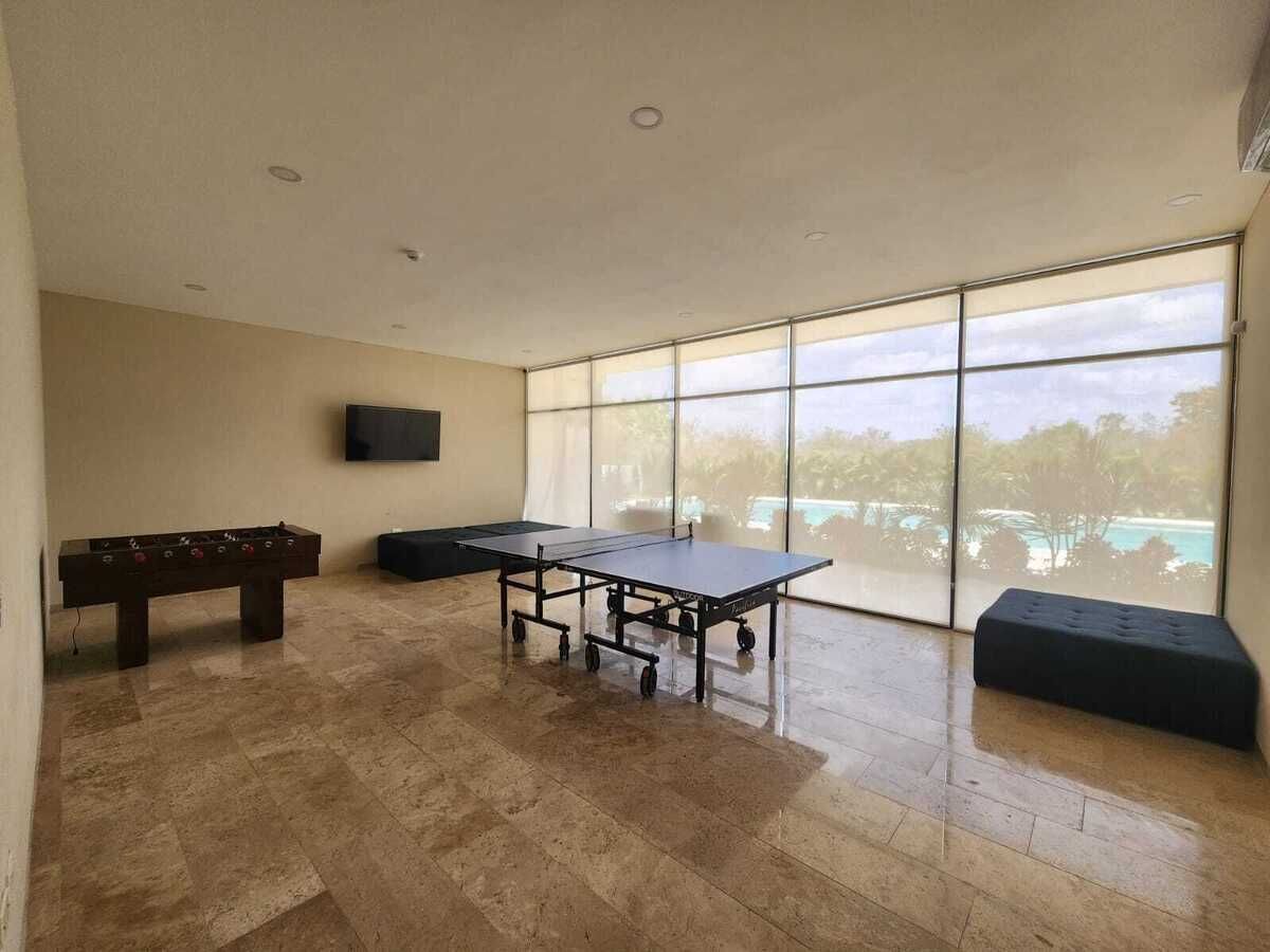 32 de 33: Área de Juegos