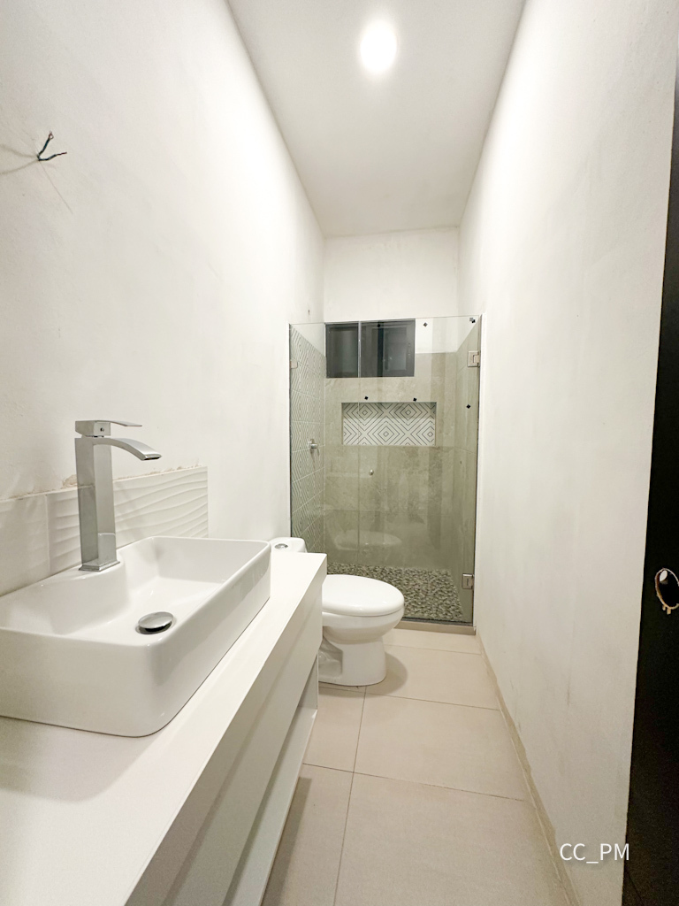 15 de 33: Baño Compartido