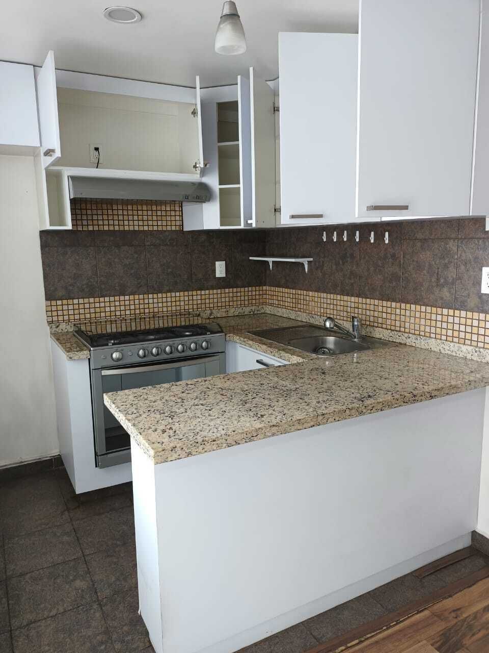 17 de 31: Cocina abierta con barra desayunador