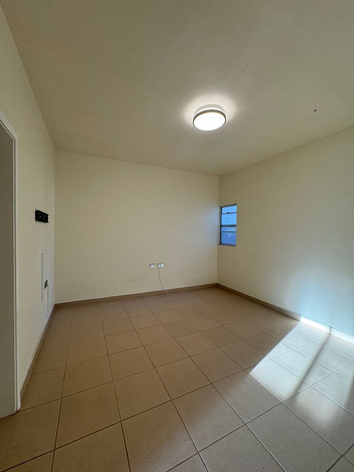 11 of 15: Área de cuarto de TV