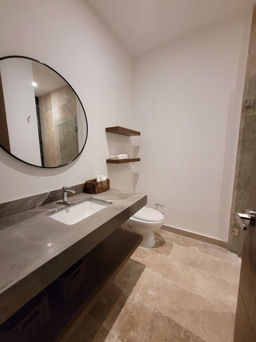 12 de 15: Baño Compartido