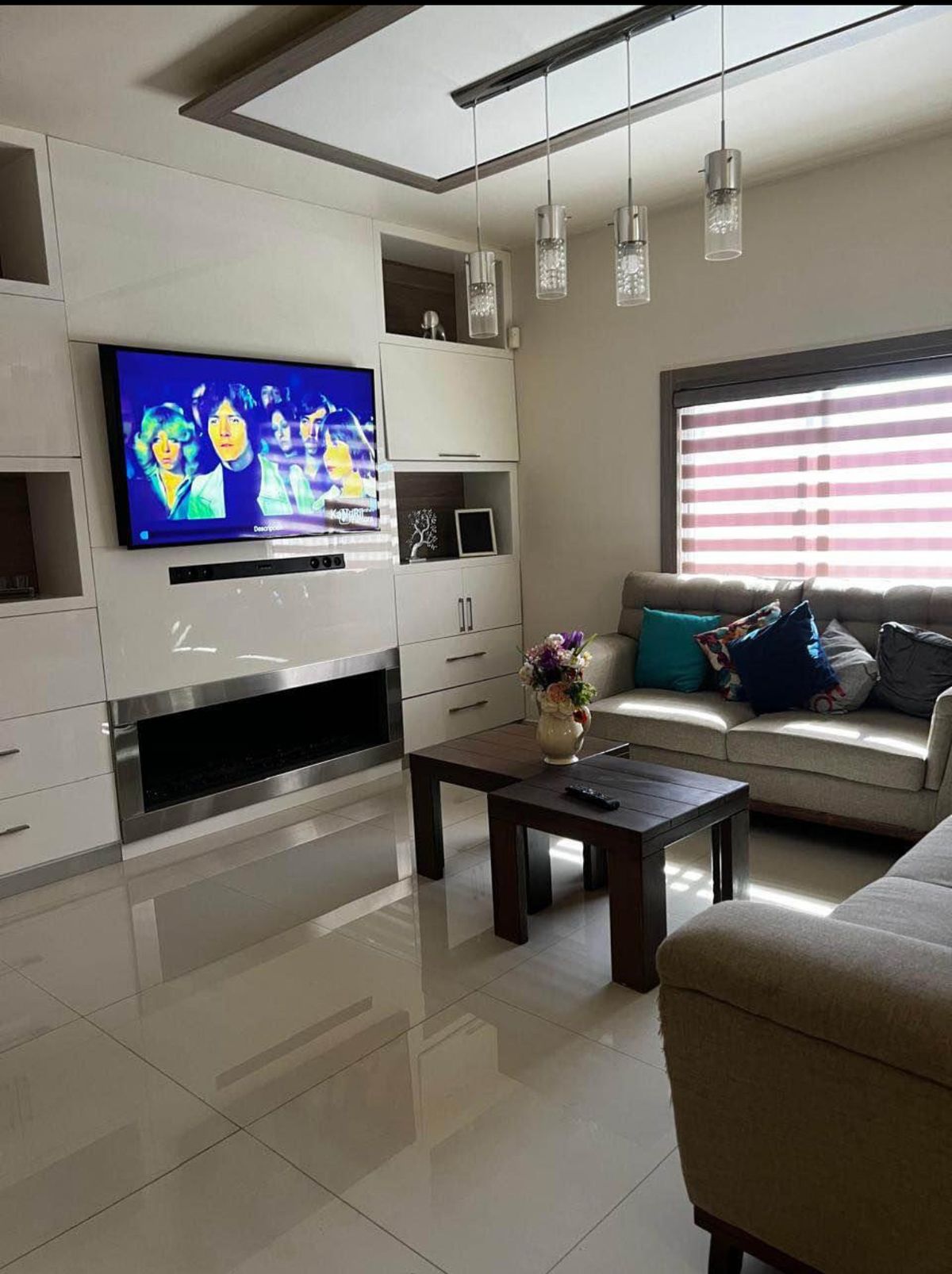 5 de 12: Sala con tv