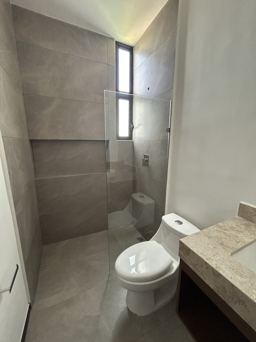 7 de 14: Baño Compartido