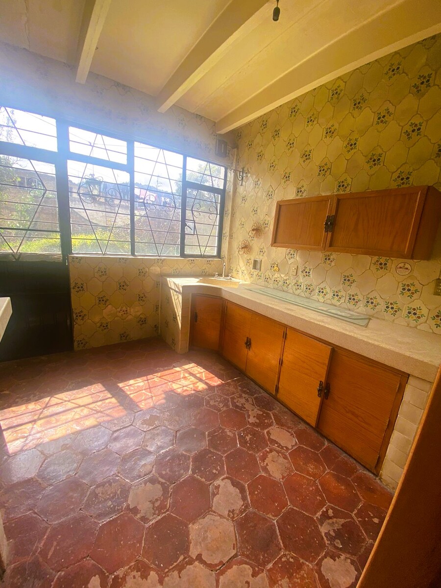 9 de 14: COCINA CON VISTA AL JARIN