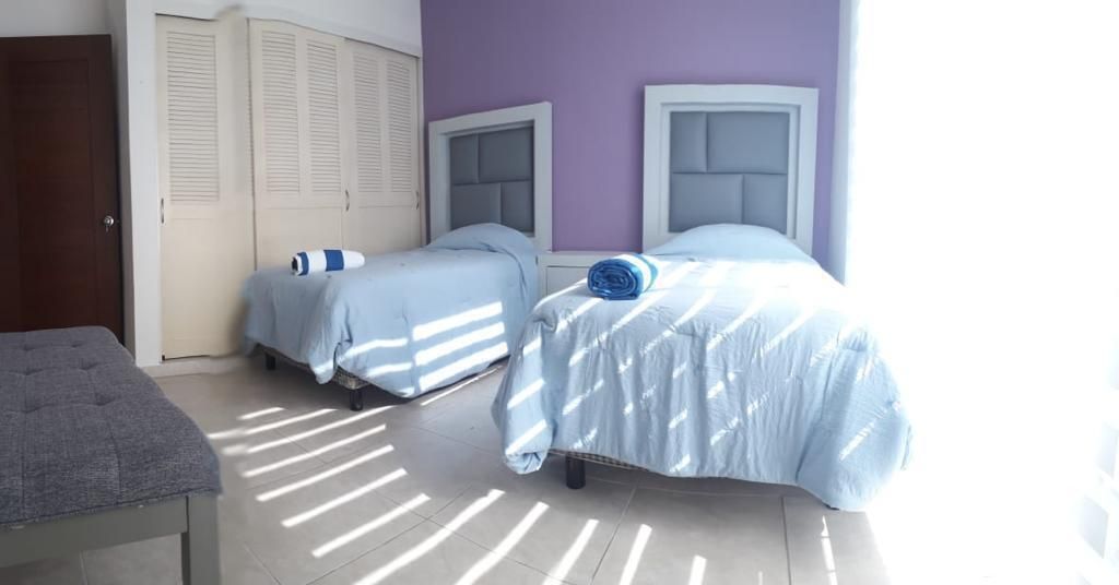12 de 22: Segunda recámara con closet amplio y baño completo
