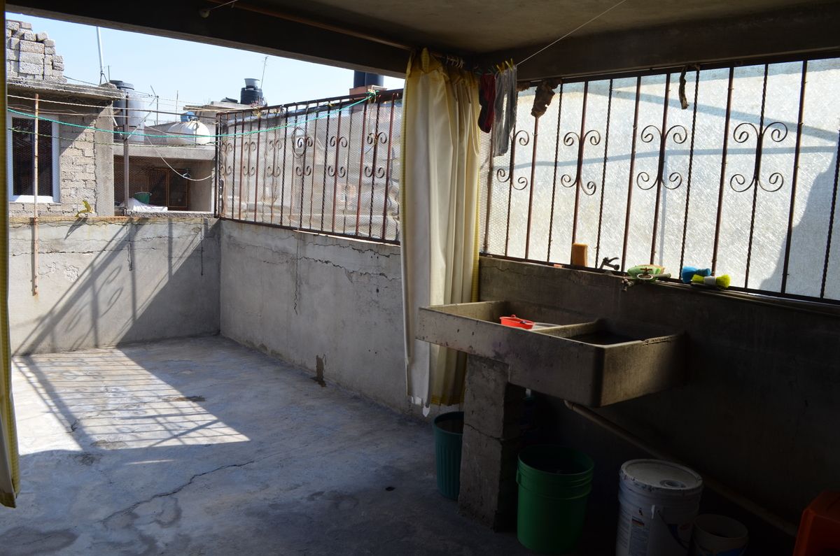 20 de 21: Área de Lavado y tendido