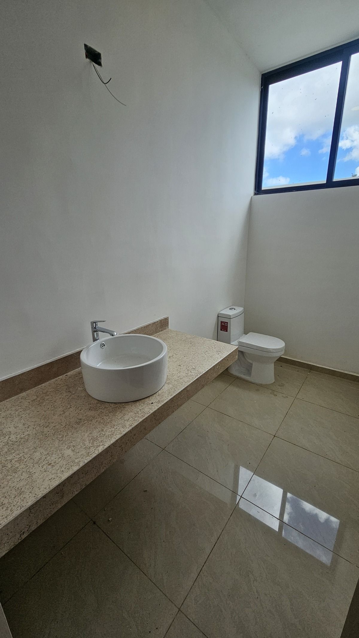 4 de 18: MEDIO BAÑO