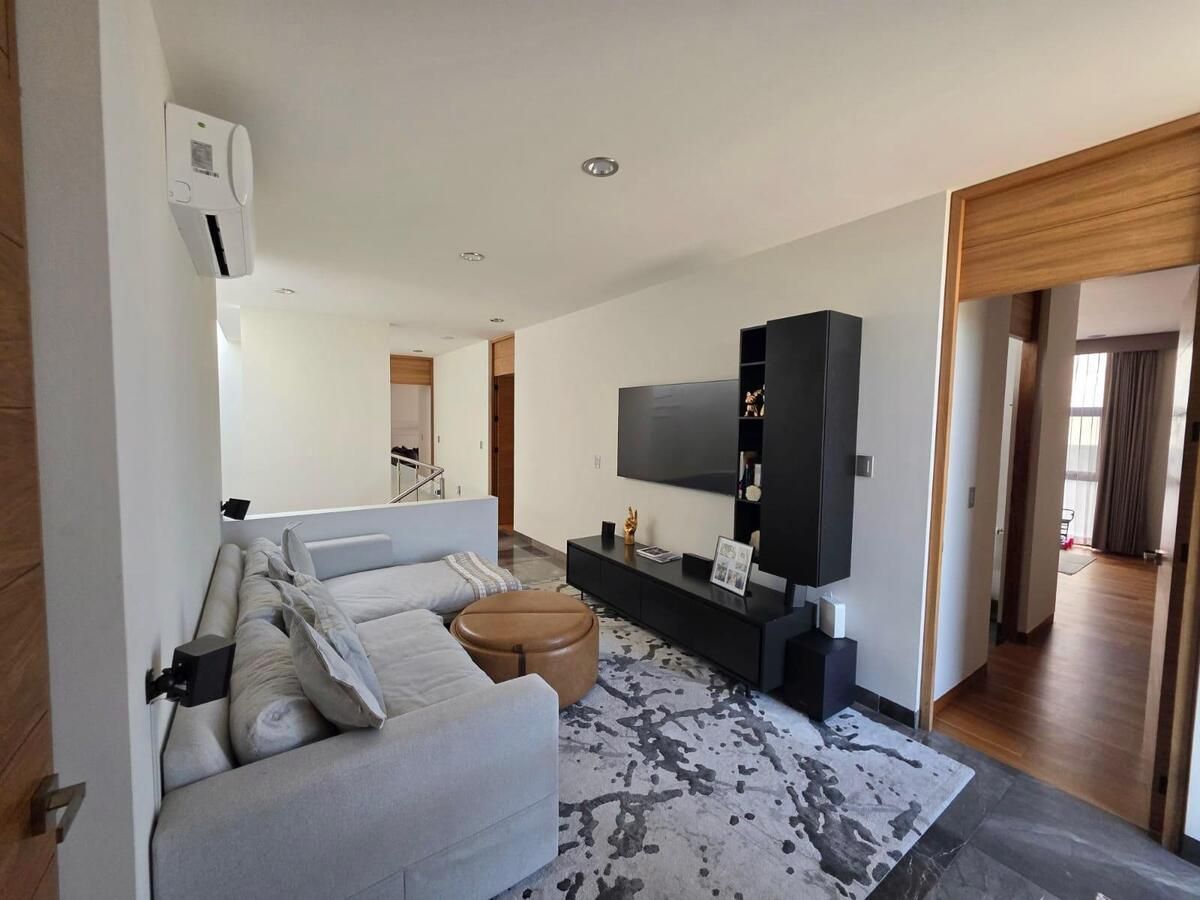 12 de 25: Sala de TV