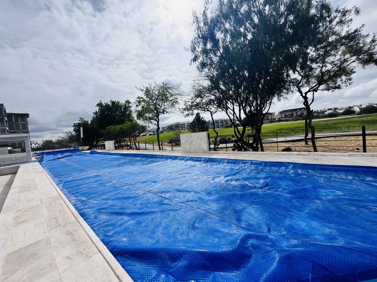 32 of 37: ALBERCA CON CARRIL DE NADO JUNTO AL GOLF