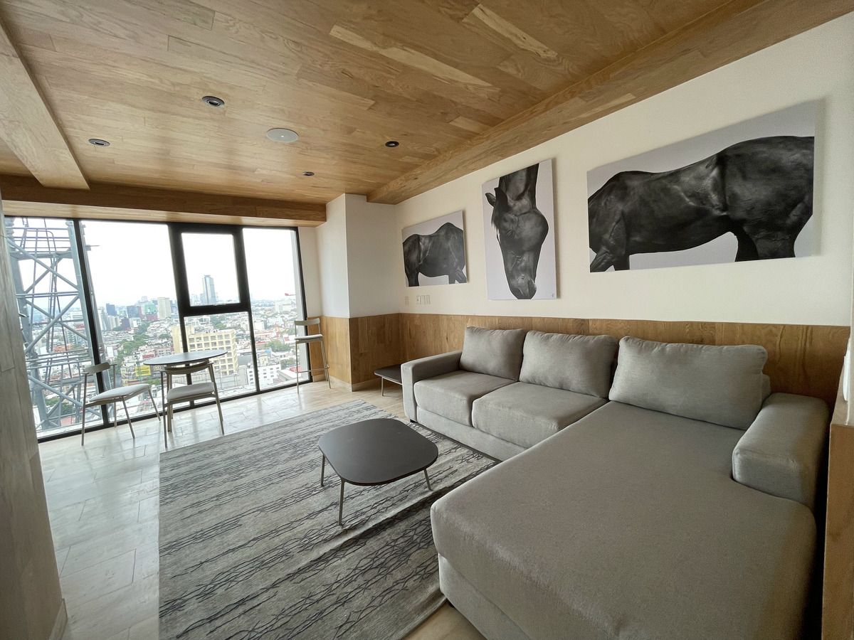 29 de 37: Sala TV común