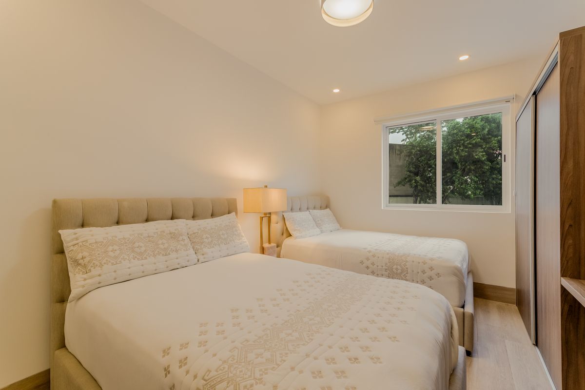 16 of 28: Segunda Recamara 2 camas Queen